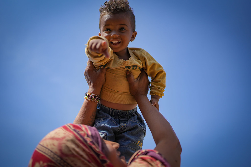 A little boy in Yemen enjoys a happy and active life after making a full recovery from acute malnutrition, thanks to a UN therapeutic feeding programme. 